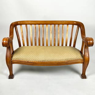 EMPIRE-STYLE LOVESEAT Early 20th Century Back height 31.5". Seat height 15". Length 50". Depth 26".: EMPIRE-STYLE LOVESEATEarly 20th CenturyIn tiger maple and maple. Bulbous carved arms. Paw feet.Back height 31.5". Seat height 15". Length 50". Depth 26".