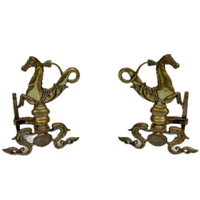 PAIR OF BRASS SEAHORSE ANDIRONS Late 19th/Early 20th Century Heights 15". Depths 18".
