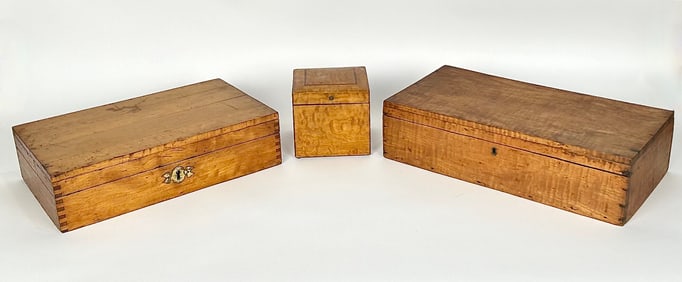 THREE FIGURED MAPLE BOXES Late 19th to Early 20th Century Largest height 4.5". Width 17". Depth