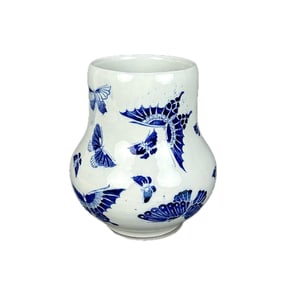 CHINESE BLUE AND WHITE PORCELAIN GOURD-FORM VASE Early 20th Century Height 9.5". Diameter 8.5".