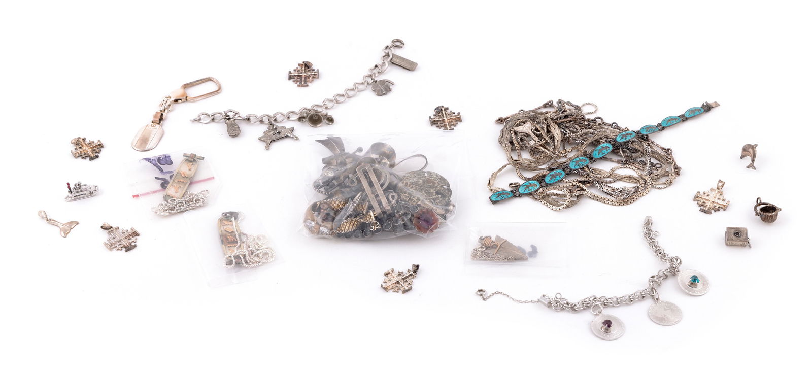 APPROX. FORTY-SEVEN PIECES OF STERLING SILVER JEWELRY Approx. 174.05 total dwt.: APPROX. FORTY-SEVEN PIECES OF STERLING SILVER JEWELRYCharms, pendants, chains, bracelets, a key chain, etc. Stamped.Approx. 174.05 total dwt.