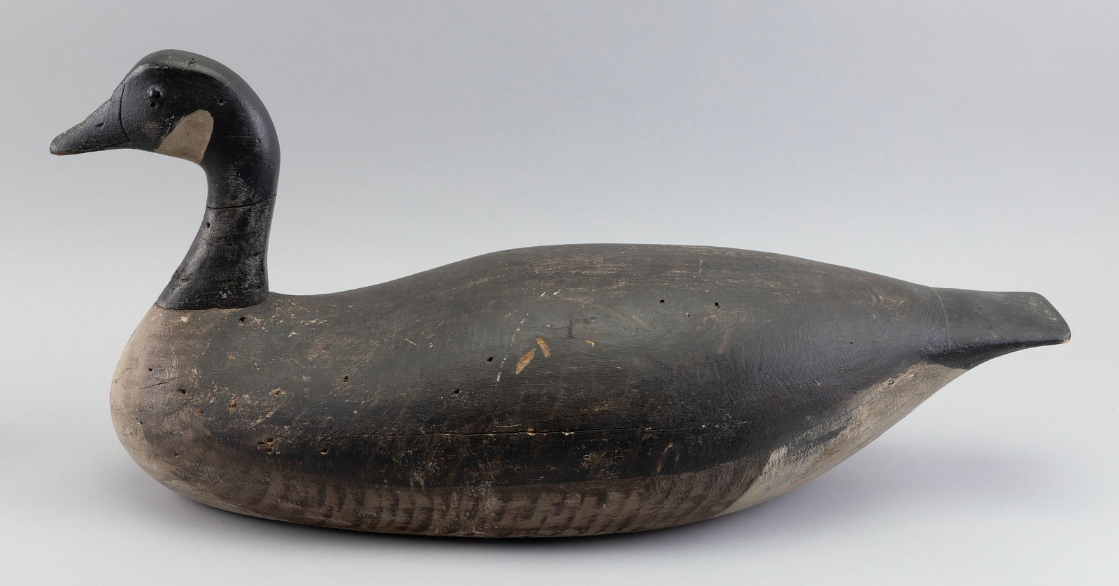 JOE LINCOLN CANADA GOOSE DECOY Accord, Massachusetts, 1859-1938 Length 27". (1 of 3)
