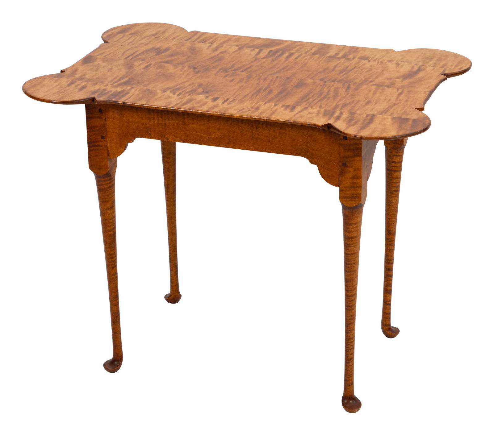 ELDRED WHEELER-STYLE TEA TABLE 20th Century Height 26.5". Length 33". Width 22.5".: ELDRED WHEELER-STYLE TEA TABLE20th CenturyIn tiger maple. Overhanging top with bold turret corners.Height 26.5". Length 33". Width 22.5".