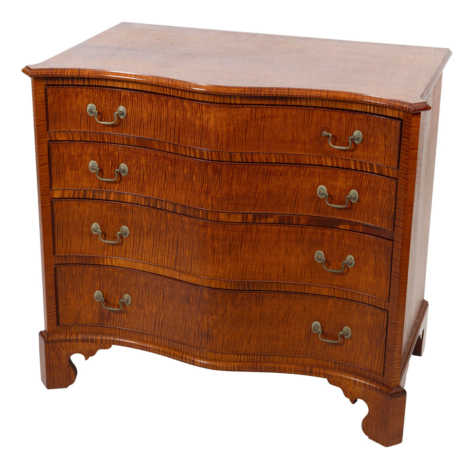CUSTOM-MADE ELDRED WHEELER-STYLE SERPENTINE-FRONT CHEST 20th Century Height 34.5". Width 38.5".: CUSTOM-MADE ELDRED WHEELER-STYLE SERPENTINE-FRONT CHEST20th CenturyIn strongly figured tiger maple. Four graduated full-width drawers. Shaped ogee bracket base.Height 34.5". Width 38.5". Depth 23".