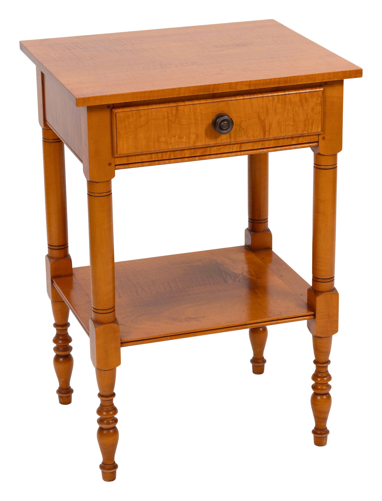 ELDRED WHEELER ONE-DRAWER STAND Massachusetts, 20th Century Height 29". Width 20". Depth 17".: ELDRED WHEELER ONE-DRAWER STANDMassachusetts, 20th CenturyIn tiger maple. Block and turned legs also support a medial shelf. Original Eldred Wheeler label inside drawer.Height 29". Width 20". Depth 17