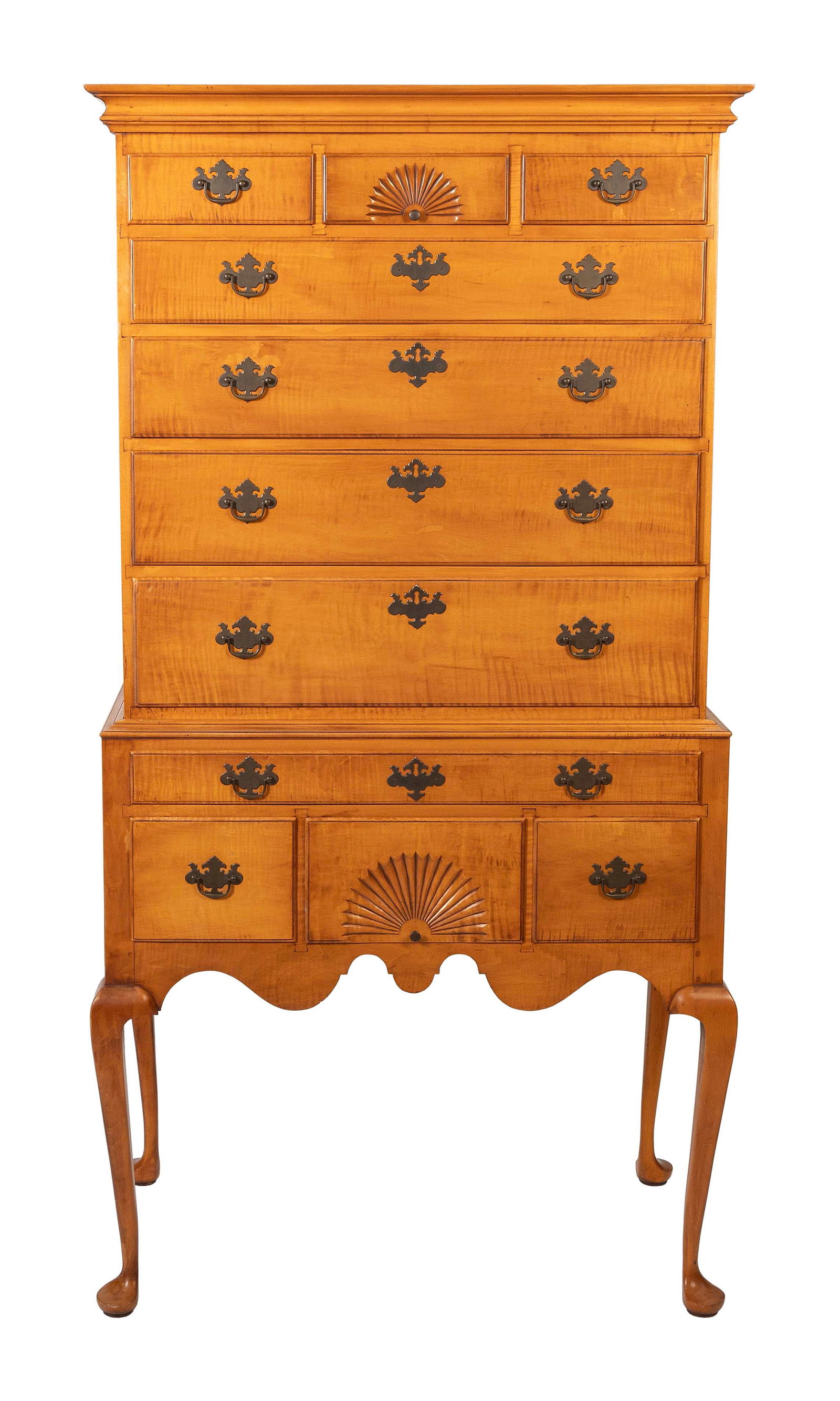 ELDRED WHEELER TWO-PART HIGHBOY Massachusetts, 20th Century Height 71". Width 36". Depth 19".: ELDRED WHEELER TWO-PART HIGHBOYMassachusetts, 20th CenturyIn tiger maple. Upper section with three side-by-side drawers, the central with fan carving, over four graduated full-width drawers. Lower sec