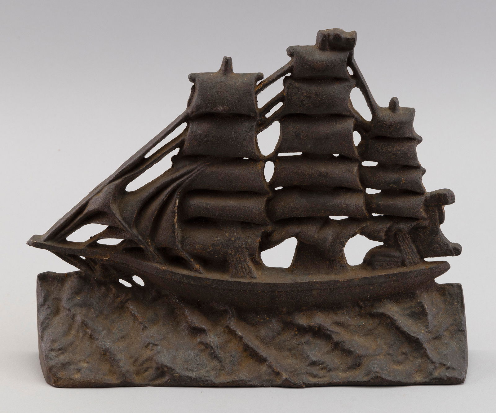 CAST IRON CLIPPER SHIP DOORSTOP America, Circa 1920 Height 10". (1 of 2)