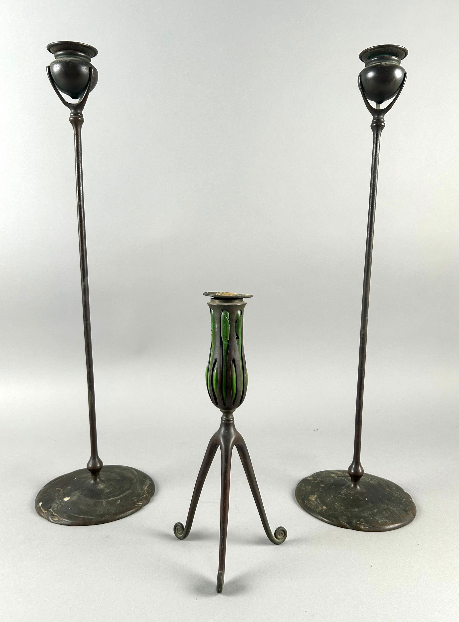 PAIR OF TIFFANY STUDIOS BRONZE CANDLESTICKS New York, Early 20th Century Heights 10.5" and 21". (1 of 5)