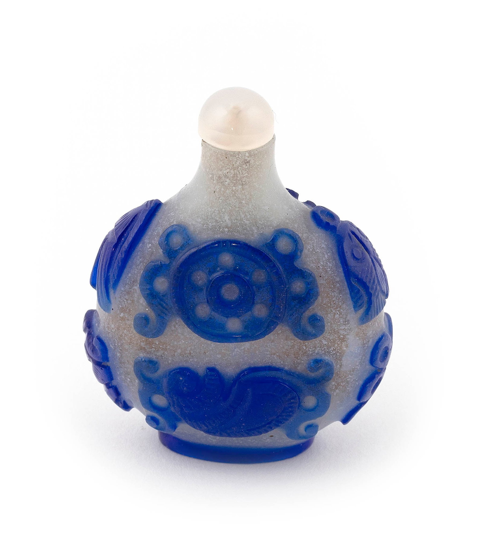 CHINESE BLUE CUT TO SNOWFLAKE OVERLAY GLASS SNUFF BOTTLE Late 19th Century Height 2.5". Glass: CHINESE BLUE CUT TO SNOWFLAKE OVERLAY GLASS SNUFF BOTTLE Late 19th Century Ovoid form. Coin and fruit decoration. Height 2.5". Glass stopper.