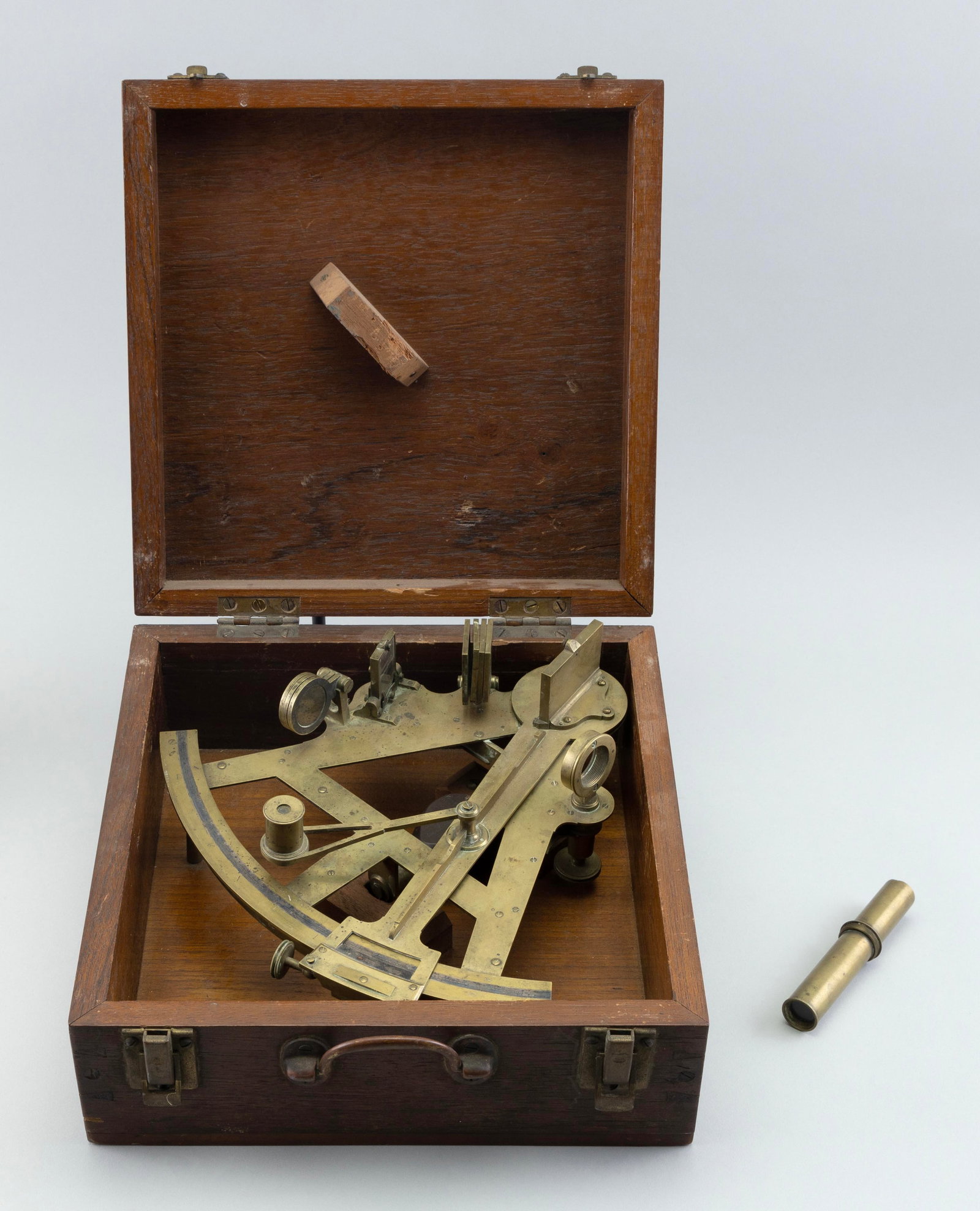 CASED SKELETONIZED BRASS SEXTANT London, 19th Century Case height 5". Width 11.25". Depth 11.25". (1 of 2)