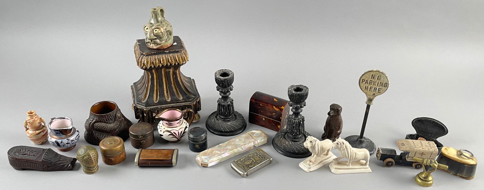ODD LOT OF SMALL ITEMS 19th/20th Century Heights from 2" to 6".: ODD LOT OF SMALL ITEMS19th/20th CenturyIncludes snuff boxes, match safes, miniature luster pitchers, carved bone lions, a snake-form inkwell, a pottery dog and more.Heights from 2" to 6".