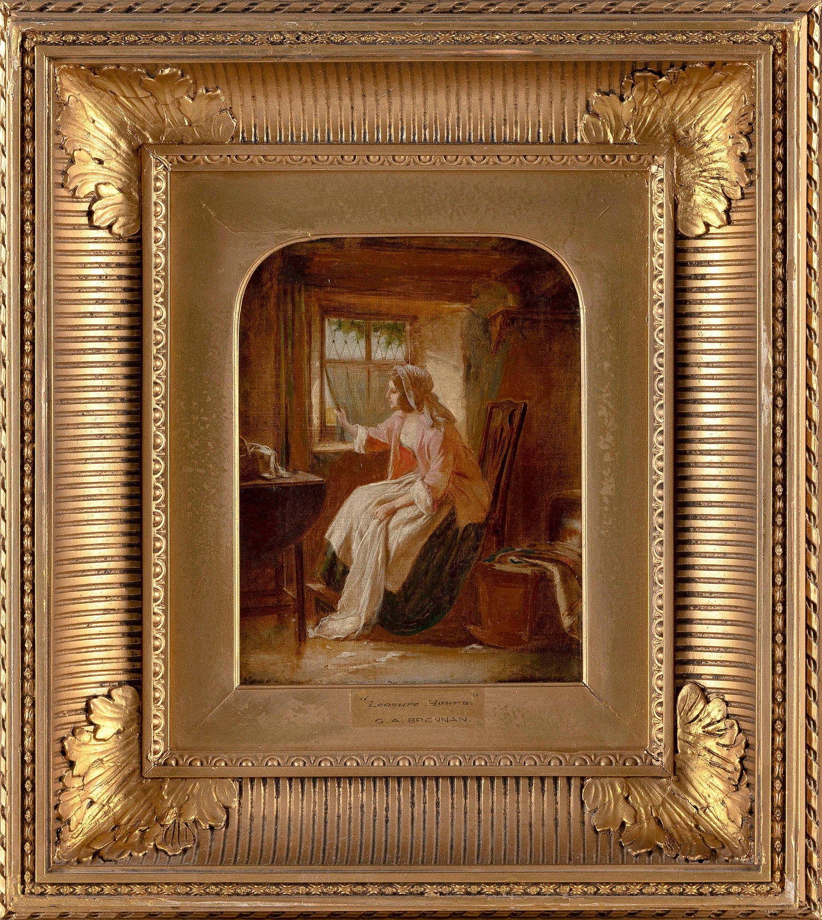 G.A. BRENNAN (England, 19th Century), "Leisure Hours", Oil on canvas, 9” x 11”. Framed: G.A. BRENNAN England, 19th Century "Leisure Hours", depicting a woman at a window and a baby in a cradle. Unsigned. Titled and artist identified as "G. A. Brennan" on label on fron