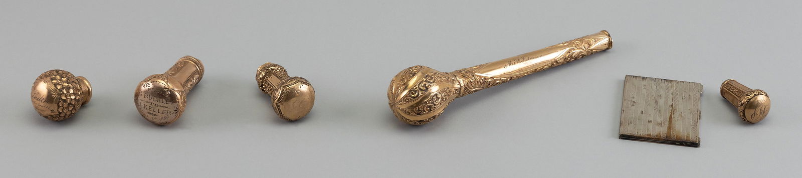 FIVE GOLD PLATED CANE HANDLES AND AN ITALIAN SILVER CARD CASE Late 19th/Early 20th Century Lengths (1 of 2)