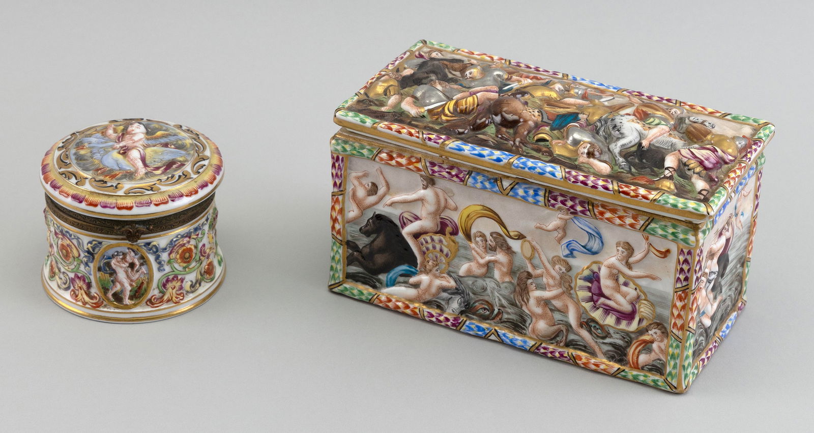 TWO CAPODIMONTE PORCELAIN DRESSER BOXES Italy, Late 19th Century Heights 2.75" and 3.75". (1 of 3)