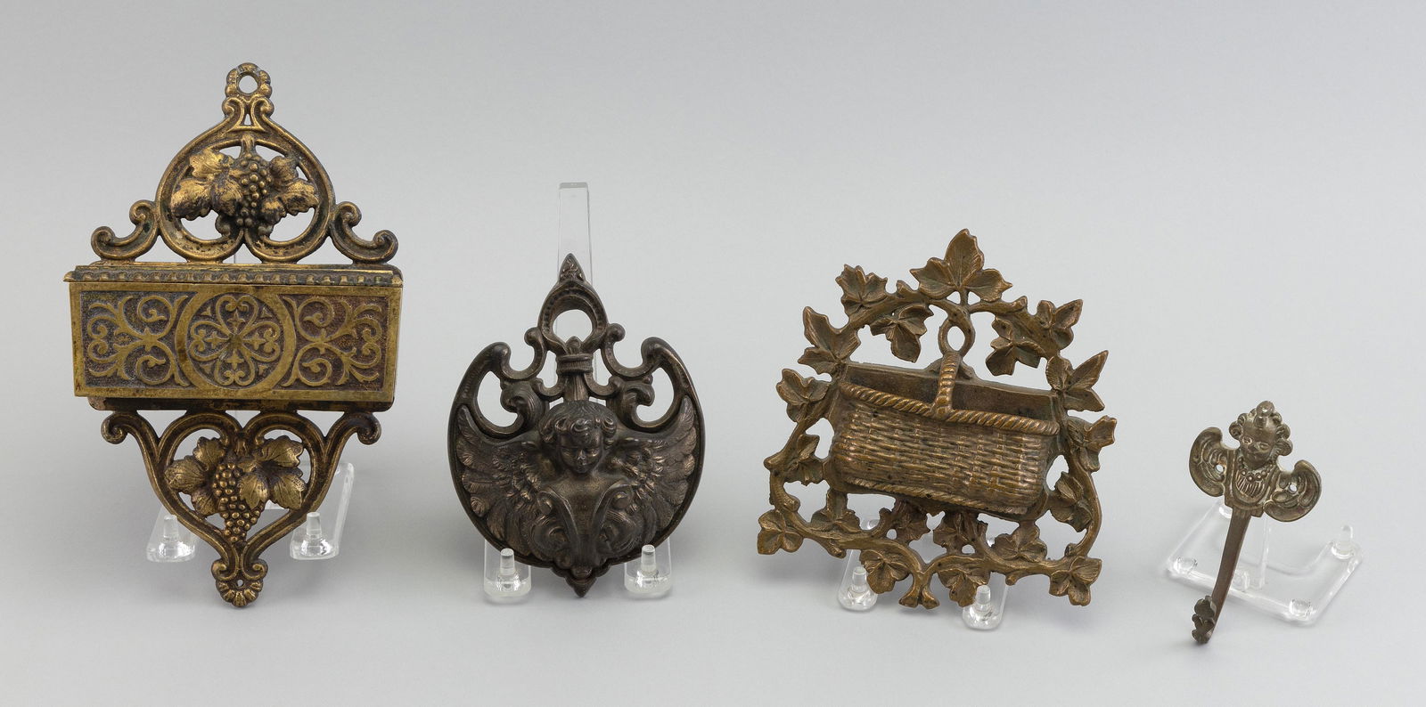 THREE VICTORIAN BRASS MATCH SAFES AND A FIGURAL BRASS HOOK Heights from 4" to 9". (1 of 1)