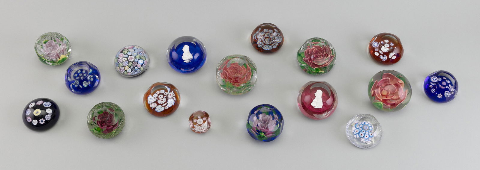 SEVENTEEN PAIRPOINT PAPERWEIGHTS Bourne, Massachusetts, 20th Century Heights from 1" to 3".: SEVENTEEN PAIRPOINT PAPERWEIGHTSBourne, Massachusetts, 20th CenturyThirteen with original labels.Heights from 1" to 3".