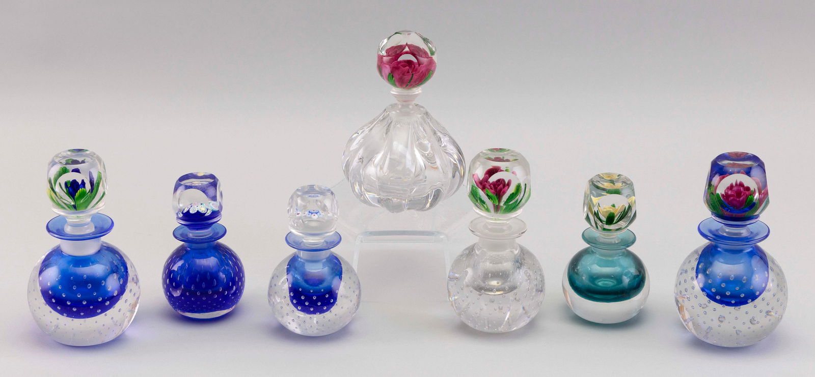 SEVEN PAIRPOINT GLASS PAPERWEIGHT PERFUME BOTTLES Bourne, Massachusetts, 20th Century Heights to (1 of 1)