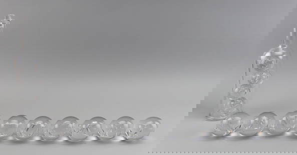 TWO MARC PETROVIC AIR BUBBLE GLASS SCULPTURES Ohio, Contemporary: TWO MARC PETROVIC AIR BUBBLE GLASS SCULPTURESOhio, Contemporary1) "Ship", from the Potion Series, with a bottle containing balls with letter-shaped air bubbles spelling out "ship". Height 13".2) Nine