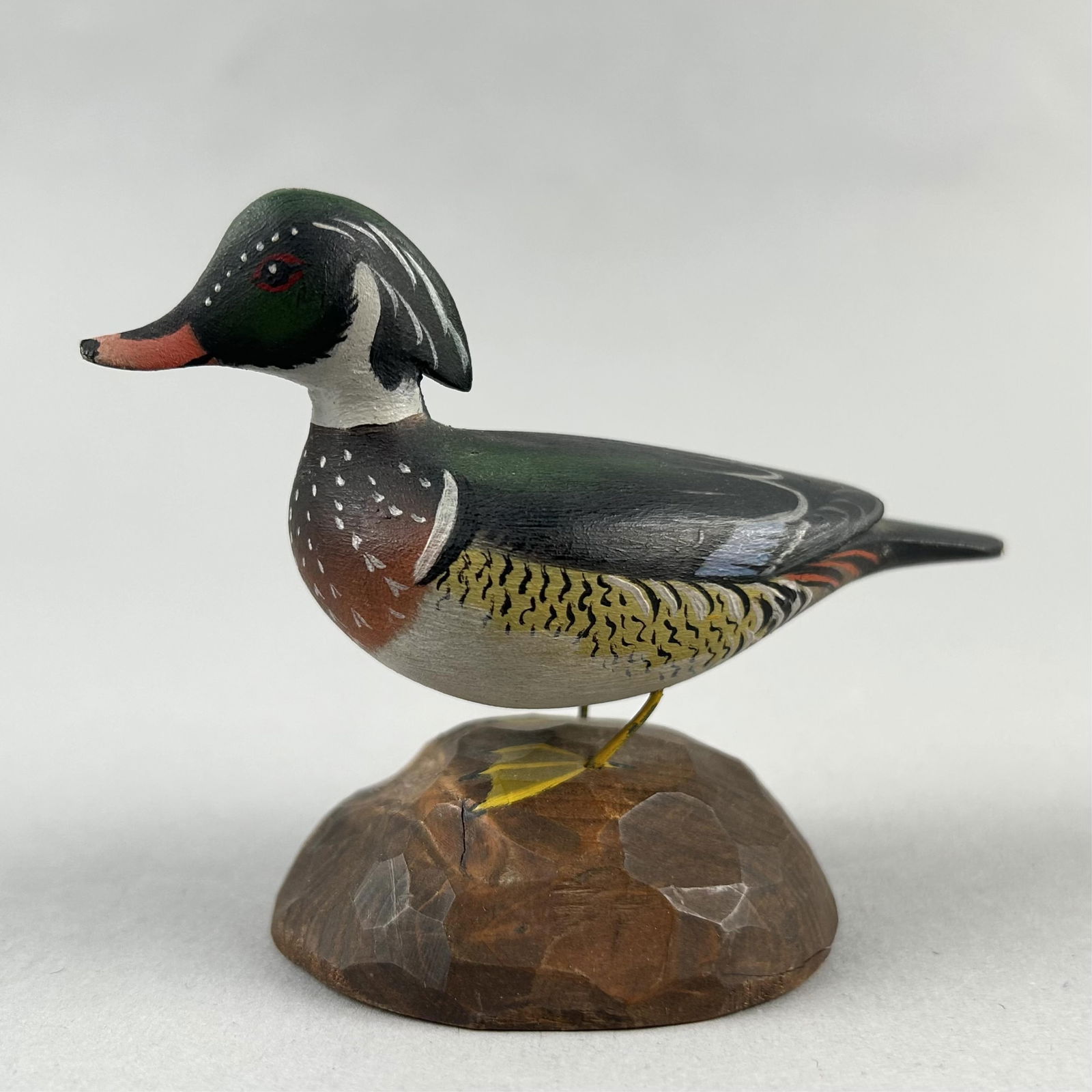 A. ELMER CROWELL MINIATURE WOOD DUCK East Harwich, Massachusetts, 1862-1952 Height 3.25". (1 of 3)