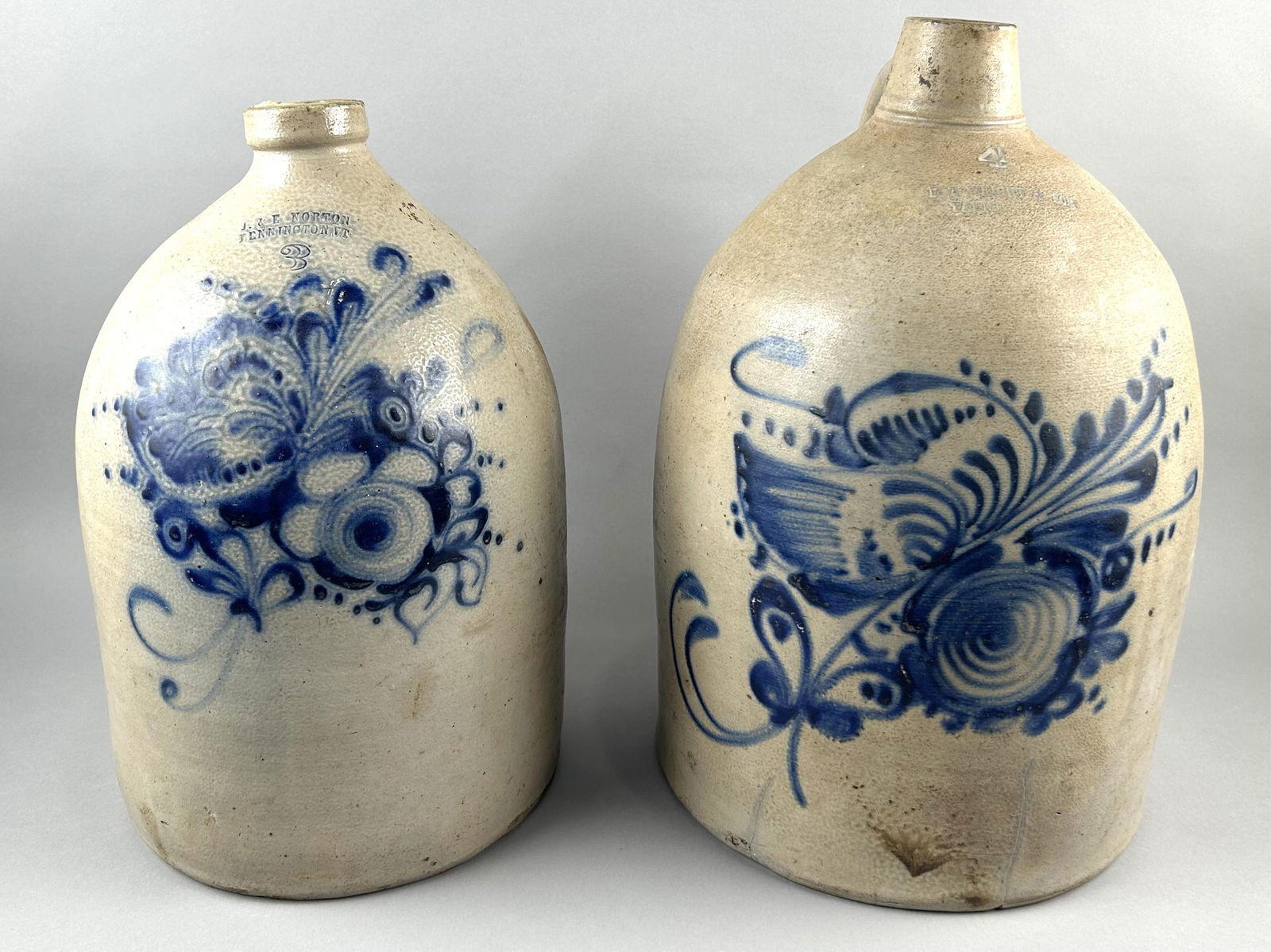 TWO STONEWARE JUGS 19th Century Heights 15" and 17". (1 of 4)