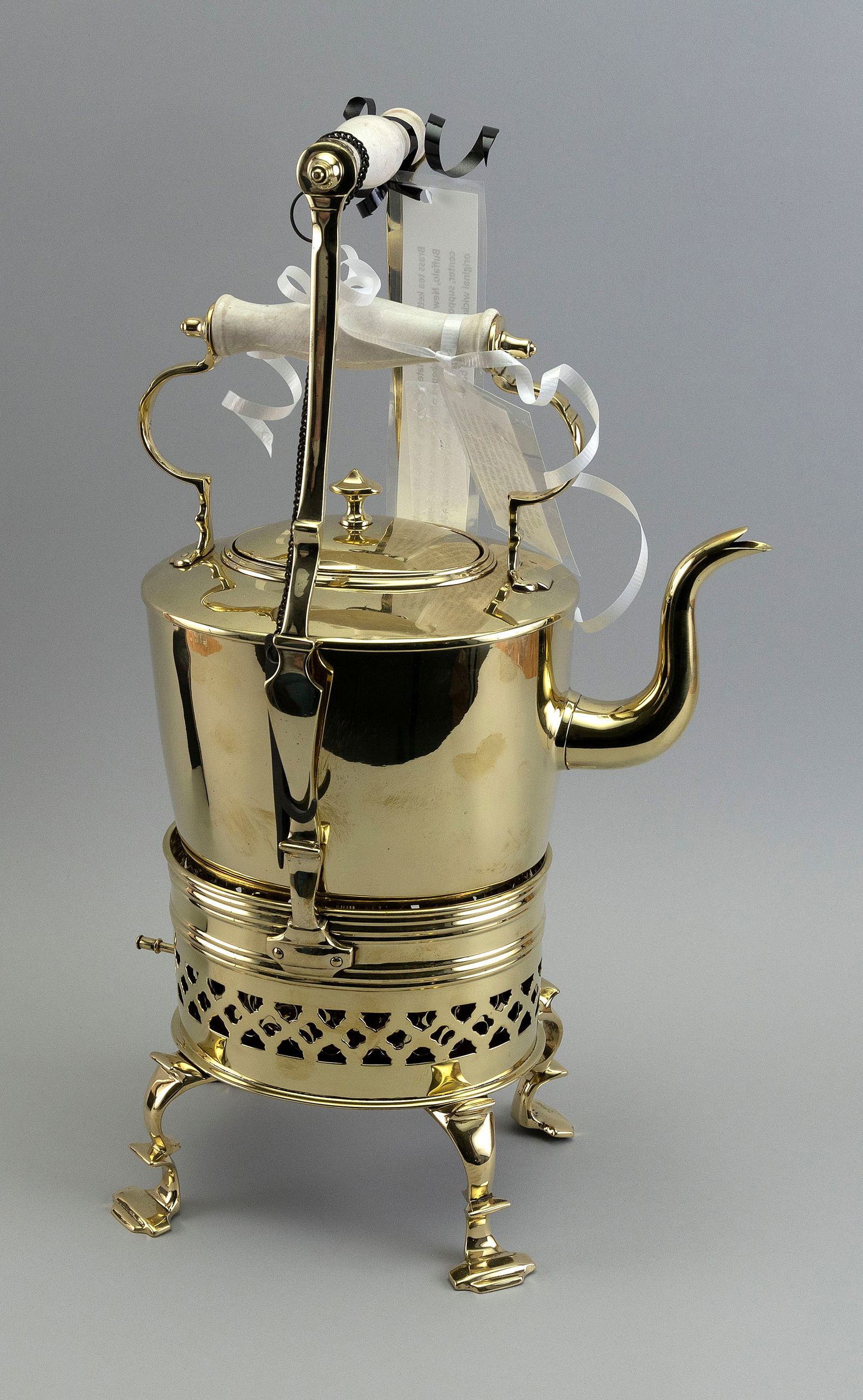 BUFFALO MFG. CO. BRASS TEA KETTLE ON STAND Buffalo, New York, Late 19th Century Height 18". (1 of 2)