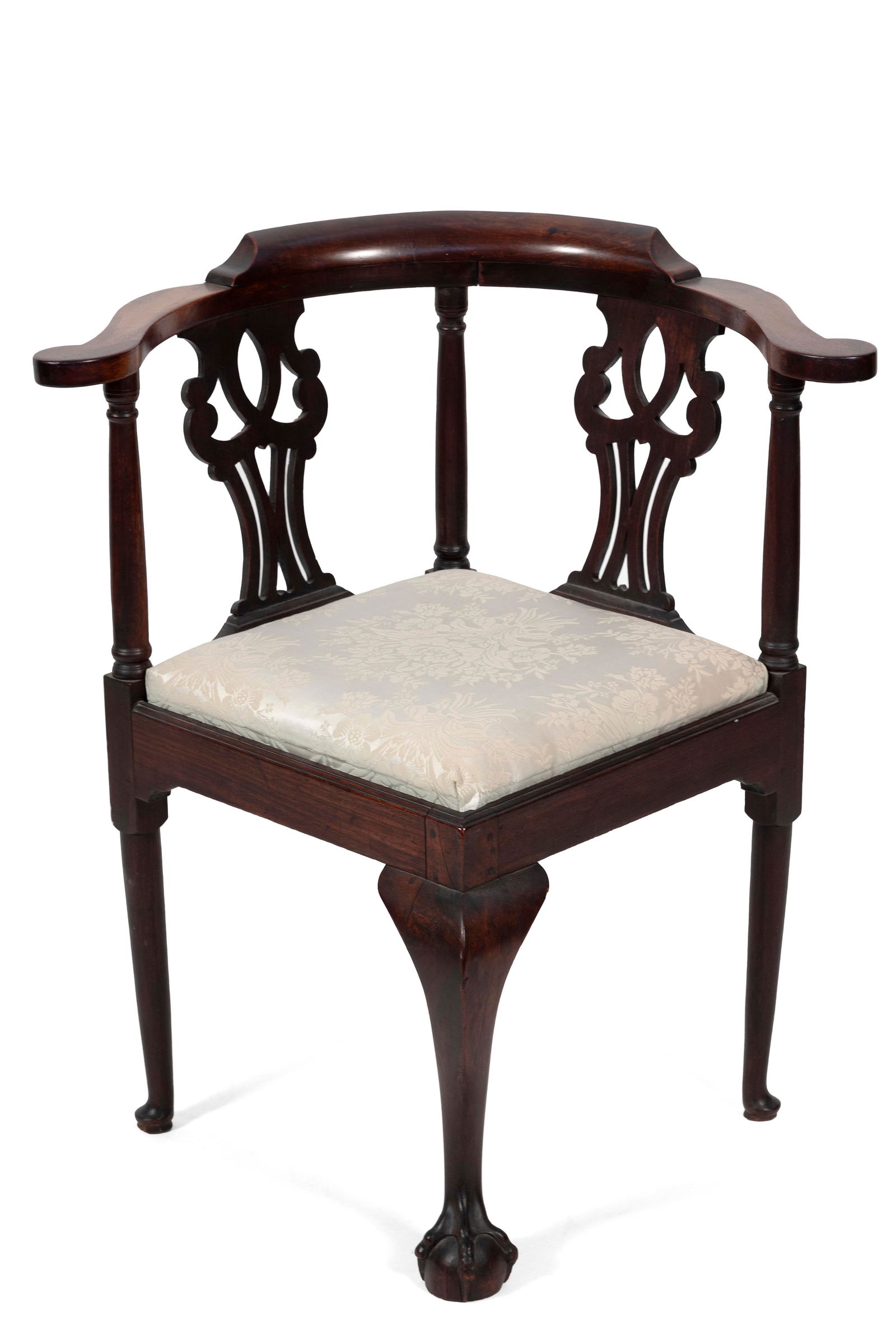 CHIPPENDALE CORNER CHAIR Massachusetts, Circa 1780 Back height 31.25". Seat height 19".: CHIPPENDALE CORNER CHAIRMassachusetts, Circa 1780In mahogany. Back with low scrolled crest and carved and pierced vertical splats. Diminutive scrolled arms with flaring ring-turned colonette supports.