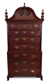 CHIPPENDALE BONNET-TOP CHEST-ON-CHEST Last Quarter of the 18th Century Height 90.5". Width 40.75".