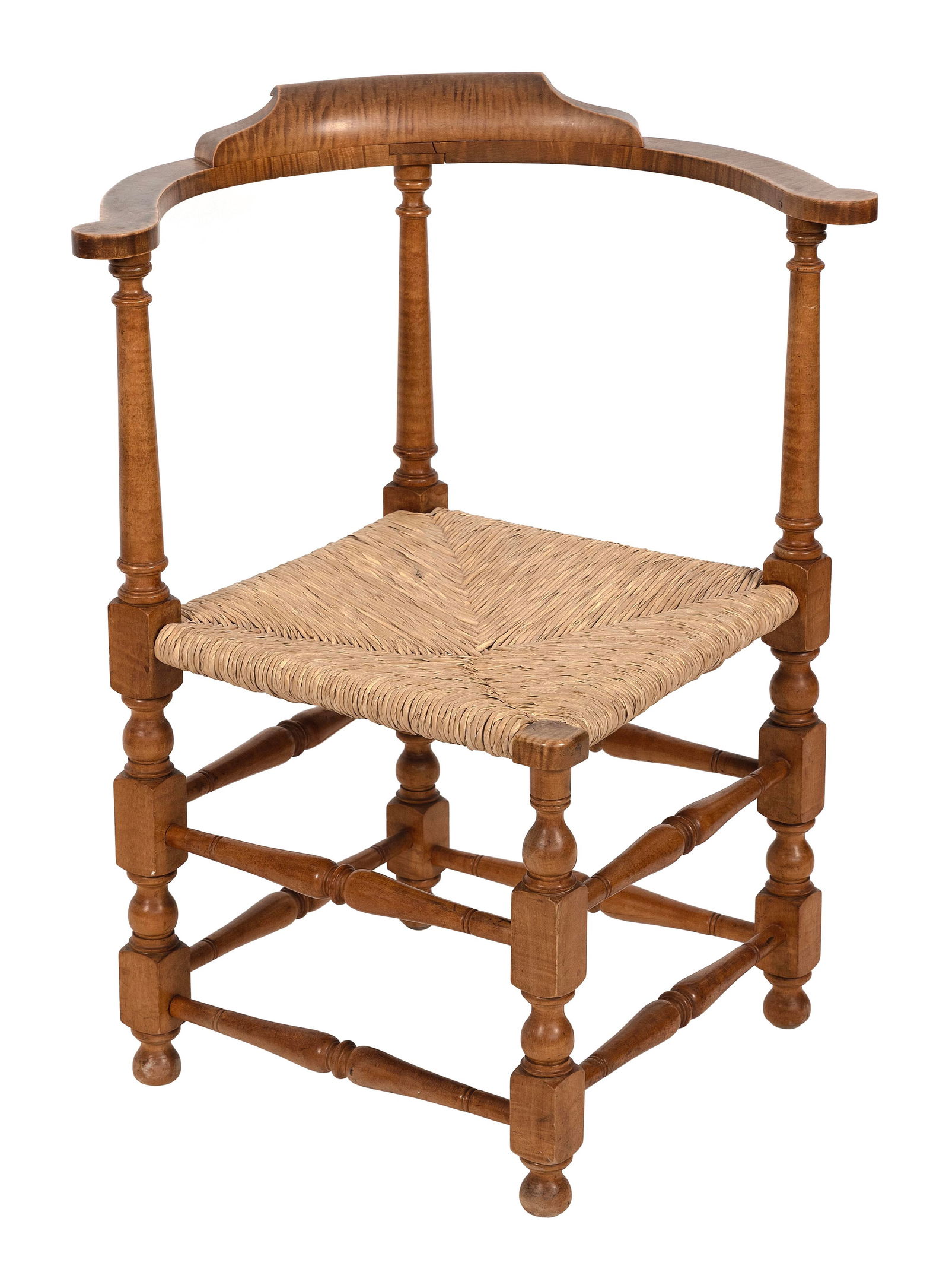 WALLACE NUTTING CORNER CHAIR Framingham, Massachusetts, 20th Century Back height 32.5". Seat height: WALLACE NUTTING CORNER CHAIRFramingham, Massachusetts, 20th CenturyIn tiger maple with rush seat. Branded "Wallace Nutting". Nutting #430.Back height 32.5". Seat height 16".