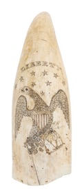 SCRIMSHAW WHALE'S TOOTH WITH A PATRIOTIC EAGLE AND SHIP PORTRAIT Mid-19th Century Length 6.5".