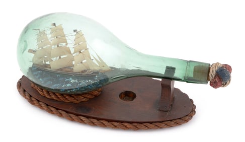 CHARMING SHIP IN A BOTTLE WITH STAND Early to Mid-20th Century Total length 12.5".