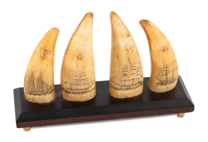 SET OF FOUR POLYCHROME SCRIMSHAW WHALE'S TEETH, POSSIBLY BY THE STAR ENGRAVER Mid-19th Century Tooth