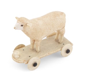 SCRIMSHAW SHEEP PULL TOY 19th Century Height 4". Length 4.75".