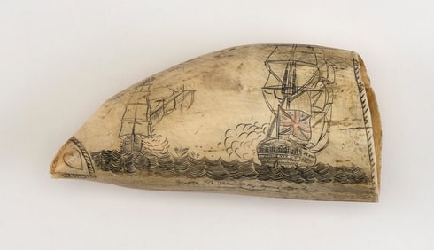 SCRIMSHAW WHALE'S TOOTH WITH NAVAL BATTLE SCENE Second Half of the 19th Century Length 5.75".