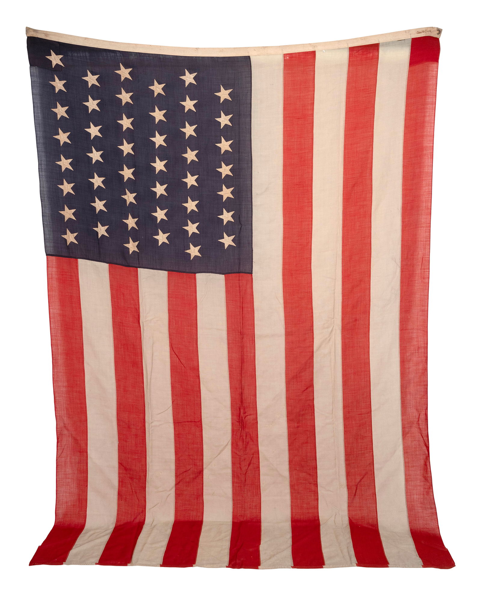 AMERICAN FORTY-FIVE STAR FLAG Late 19th/Early 20th Century Approx. 72" x 108".: AMERICAN FORTY-FIVE STAR FLAGLate 19th/Early 20th CenturyMarked "John R. Coffin" on edge. Mostly machine-stitched.Approx. 72" x 108". Provenance:A Historic Nantucket Collection, from a direct descenda