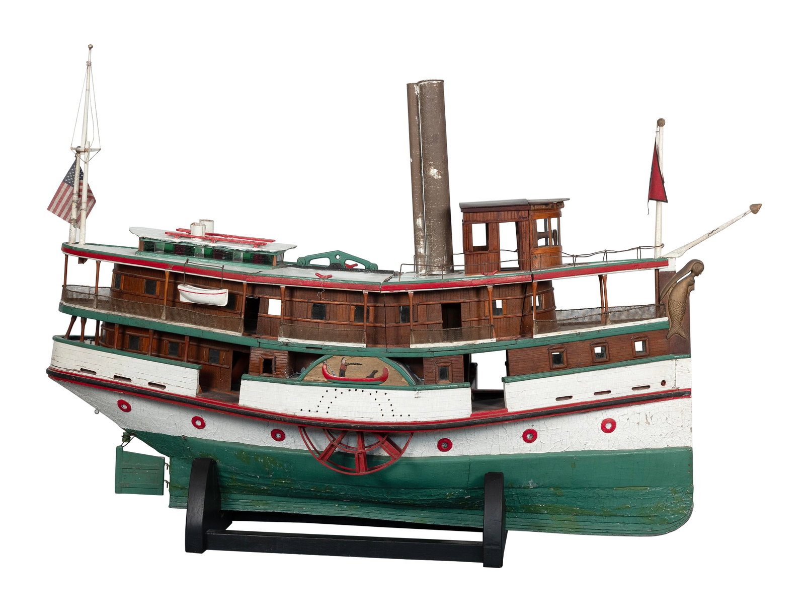 WONDERFUL FOLK ART MODEL OF A SIDE-WHEEL STEAMSHIP Second Half of the 19th Century Height 46".: WONDERFUL FOLK ART MODEL OF A SIDE-WHEEL STEAMSHIP Second Half of the 19th Century Wonderfully detailed with a mermaid figurehead, spoked ship's wheels, interior benches, stairway, marquetry floors, e