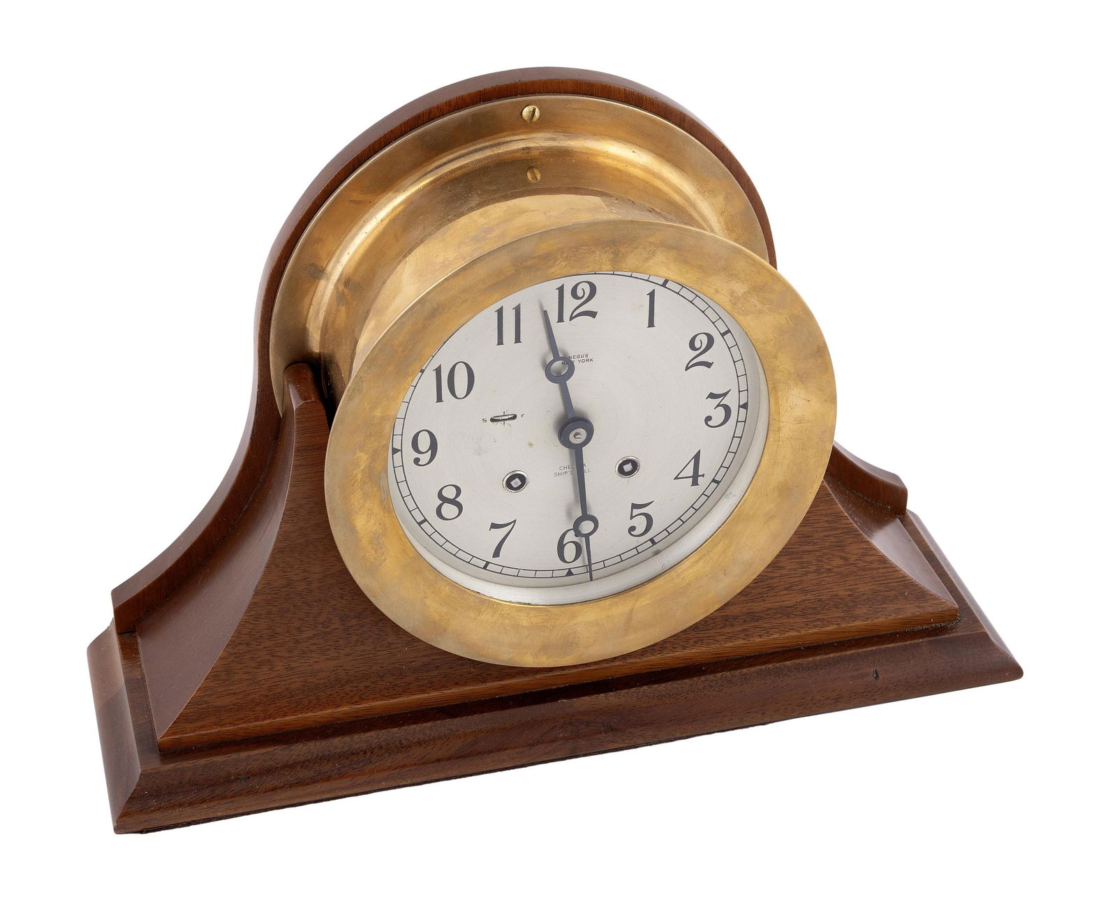NEGUS NEW YORK CHELSEA CLOCK CO. SHIP'S BELL CLOCK ON STAND Boston, Mid-20th Century Height 9". Dial: NEGUS NEW YORK CHELSEA CLOCK CO. SHIP'S BELL CLOCK ON STANDBoston, Mid-20th CenturySerial #601493. Brass case with screw bezel. Silvered Arabic numeral dial marked "Negus New York" and "Chelsea Ship's