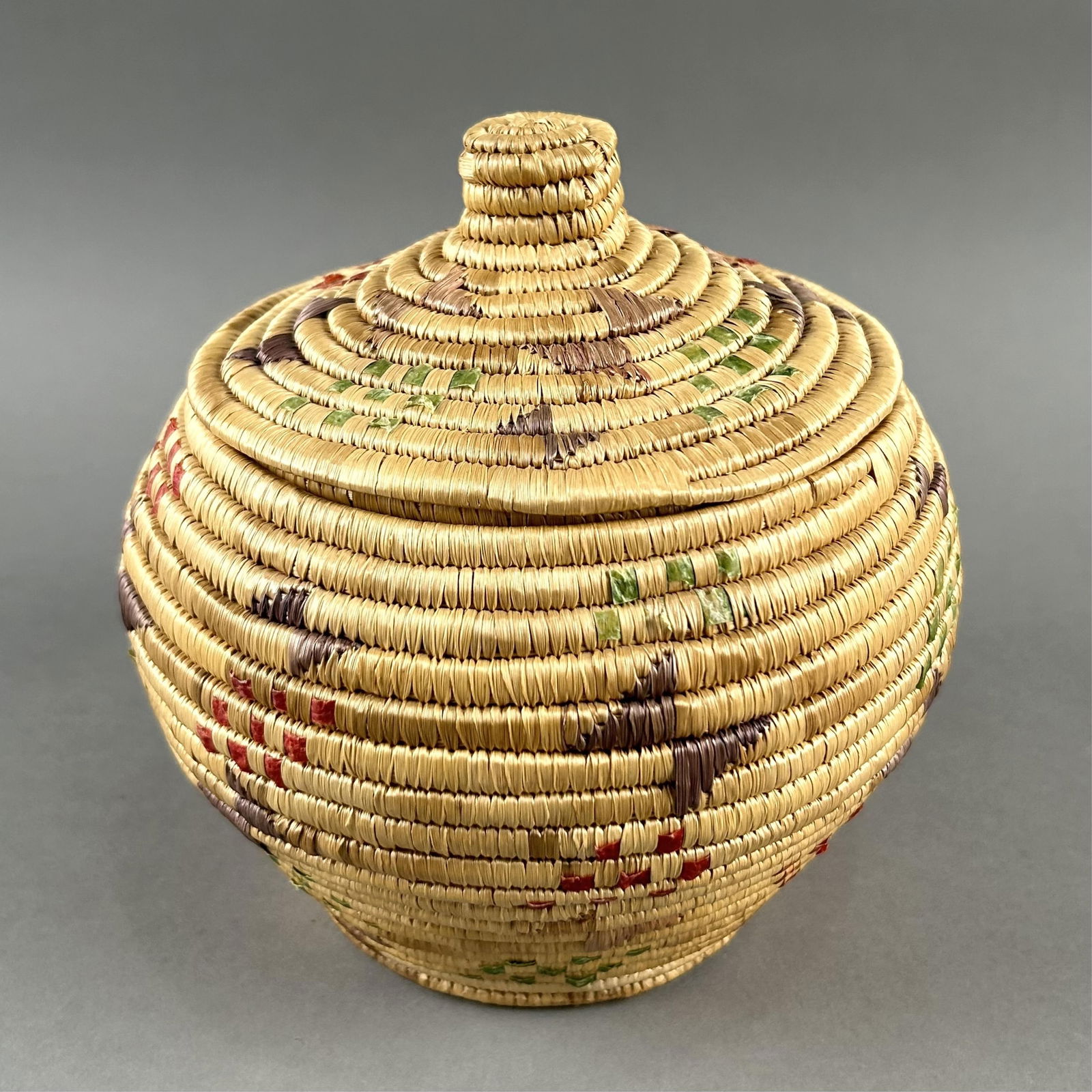 ALASKAN NATIVE LIDDED COIL BASKET 20th Century Height 8”. Width 7”. (1 of 2)