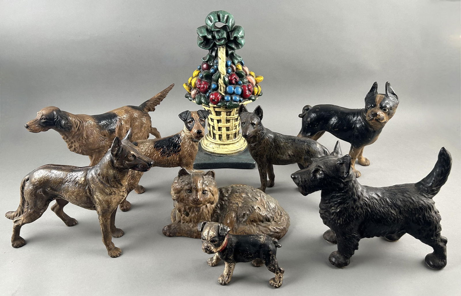 NINE CAST IRON DOORSTOPS 20th Century Heights from 4.75" to 15". (1 of 11)