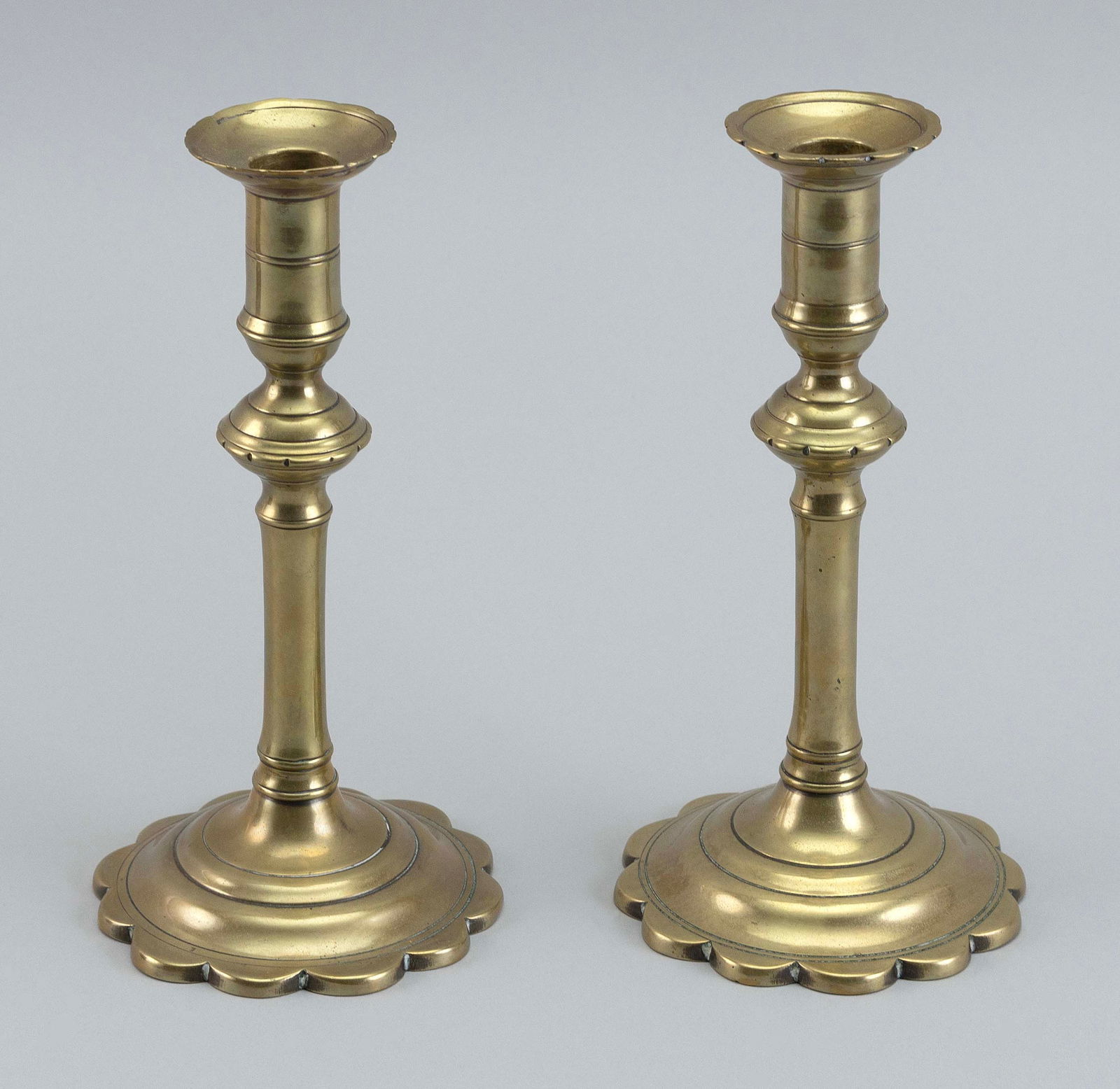 PAIR OF BRASS PETAL-BASE CANDLESTICKS 19th Century Heights 8”. (1 of 1)