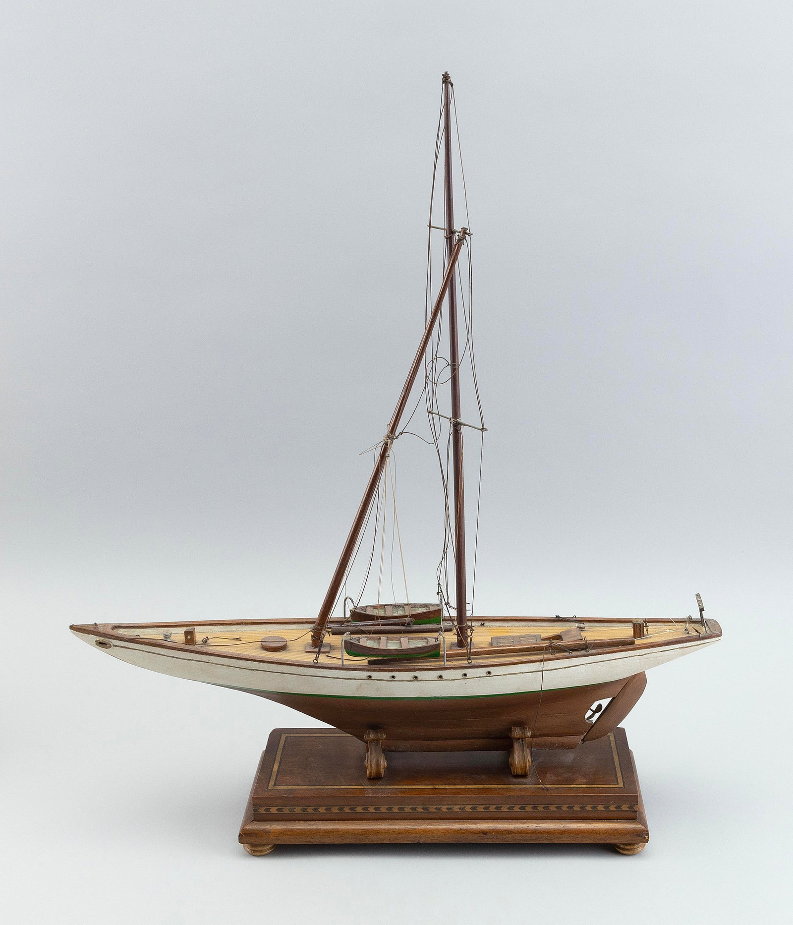 HANDMADE MODEL OF A TWO-MASTED YACHT 20th Century Total height 23".: HANDMADE MODEL OF A TWO-MASTED YACHT 20th Century On a custom wood base. Total height 23".