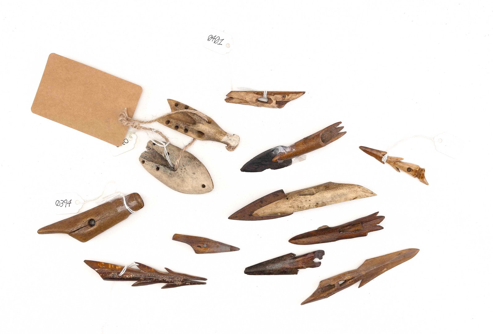 TWELVE INUIT HARPOON AND LANCE HEADS 19th/Early 20th Century Lengths from 3.25" to 5".: TWELVE INUIT HARPOON AND LANCE HEADS 19th/Early 20th Century Lengths from 3.25" to 5". Provenance: The Collection of Bob and Nina Hellman, Nantucket, Massachusetts.