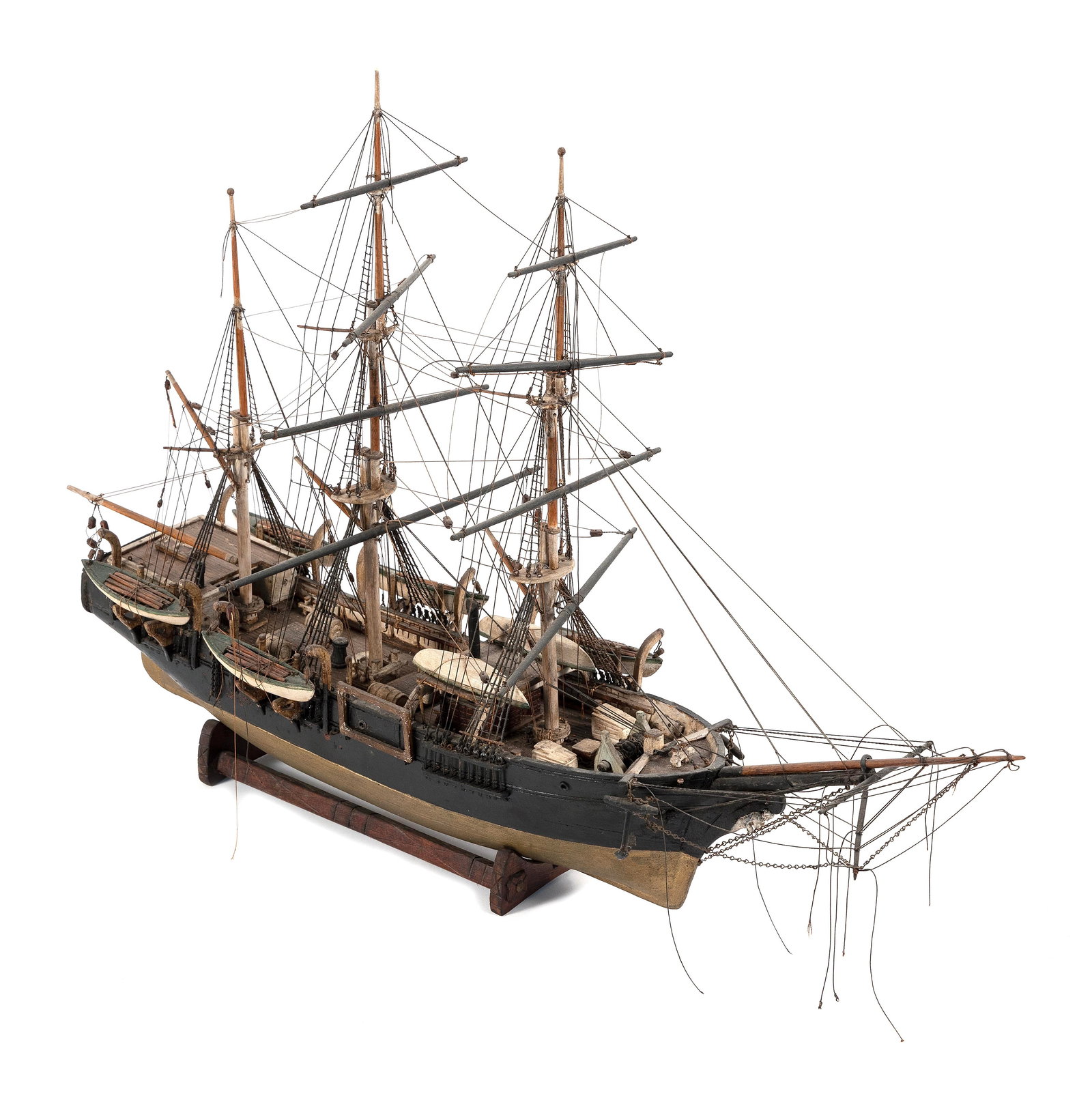 MODEL OF THE WHALESHIP "WANDERER" Early 20th Century Total height 21.75". Length 38.5".: MODEL OF THE WHALESHIP "WANDERER" Early 20th Century Black hull with gold bottom. Displayed on a wooden cradle. Total height 21.75". Length 38.5".