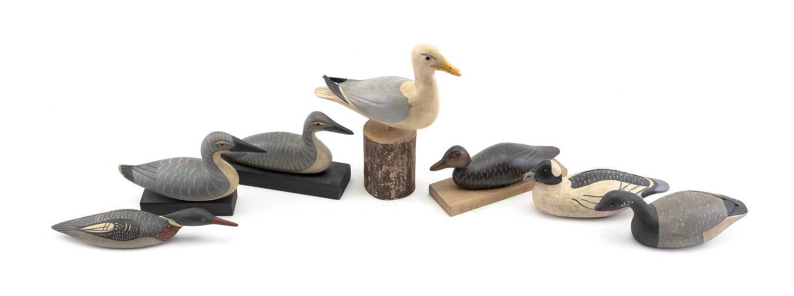 SIX GARY AVADANIAN MINIATURE BIRD CARVINGS Massachusetts, 1945-2024 Lengths from 6" to 8".: SIX GARY AVADANIAN MINIATURE BIRD CARVINGS Massachusetts, 1945-2024 Two loons, a bufflehead, a brant, a black duck and a herring gull. Lengths from 6" to 8".