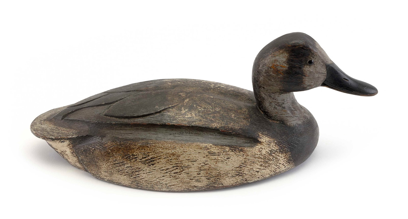 KEN ANGER CANVASBACK HEN DECOY Dunnville, Ontario, Canada, 1905-1961 Length 17".: KEN ANGER CANVASBACK HEN DECOY Dunnville, Ontario, Canada, 1905-1961 Glass eyes. Original paint. Length 17".