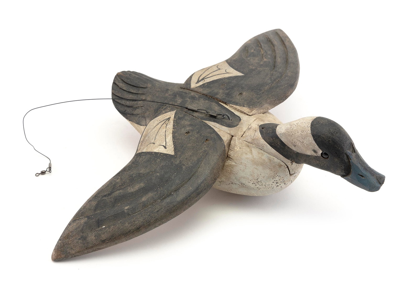 BUFFLEHEAD DRAKE CARVING Late 20th Century Length 12".: BUFFLEHEAD DRAKE CARVING Late 20th Century In flying position. Maker unknown. Glass eyes. Length 12".