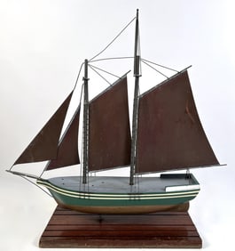 SHIP WEATHER VANE 20th Century Length 30". Displayed on a wooden stand.