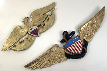 TWO CARVED WOODEN EAGLE PLAQUES Contemporary Lengths 28" and 37".