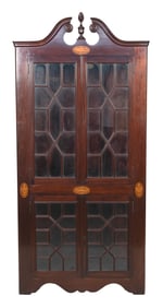 ONE-PART CORNER CUPBOARD Early 20th Century Height 80.5". Width 37.5". Takes a 27" corner.