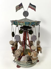 MULLER & KADADER CLOCKWORK DOLL CAROUSEL Germany, Late 19th Century Height 22".