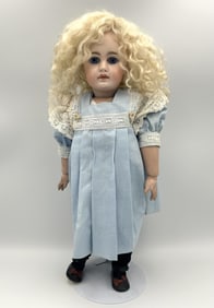 GERMAN CLOSED-MOUTH BISQUE-HEAD DOLL Circa 1910 Height 14".